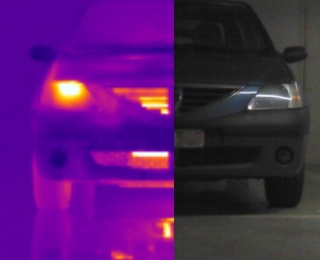 Coupled view digital and thermography of the front of a car